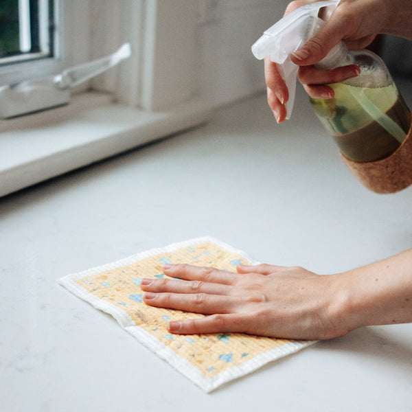 Terrazzo swedish dishcloth being used to clean a countertop